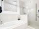 Spa-like bathroom with soaking tub, walk-in shower, and stylish decor at 260 S Osceola Ave # 1611, Orlando, FL 32801