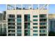 Modern high-rise building with large windows and balconies at 260 S Osceola Ave # 1611, Orlando, FL 32801