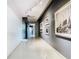 Stylish condo hallway with modern wall art and flooring at 260 S Osceola Ave # 1611, Orlando, FL 32801