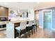 Contemporary kitchen featuring granite countertops and an island with seating at 260 S Osceola Ave # 1611, Orlando, FL 32801