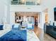 Open living area showcasing a modern kitchen and hardwood floors at 260 S Osceola Ave # 1611, Orlando, FL 32801