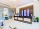 Modern condo lobby featuring a sleek reception desk and comfortable seating at 260 S Osceola Ave # 1611, Orlando, FL 32801