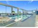 Relaxing rooftop pool and deck area with lounge chairs at 260 S Osceola Ave # 1611, Orlando, FL 32801
