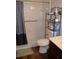 Clean bathroom with shower, toilet and grab bar at 2912 Squire Oak Ct, St Cloud, FL 34769