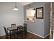 Small dining area with dark wood table and chairs at 2912 Squire Oak Ct, St Cloud, FL 34769