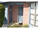 Condo's front entrance with brick and blue accents at 2912 Squire Oak Ct, St Cloud, FL 34769