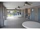 Community pool area with covered patio at 2912 Squire Oak Ct, St Cloud, FL 34769