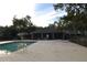 Community pool with lounge chairs and patio at 2912 Squire Oak Ct, St Cloud, FL 34769