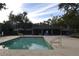 Community pool with lounge chairs and patio at 2912 Squire Oak Ct, St Cloud, FL 34769