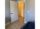 Spacious bedroom with two twin beds, nightstands and ample closet space at 3006 Bonfire Beach Dr # 102, Kissimmee, FL 34746