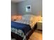 Spacious bedroom with a queen bed and nightstands at 3006 Bonfire Beach Dr # 102, Kissimmee, FL 34746