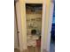 Well-organized closet with wire shelving, stocked with linens and blankets at 3006 Bonfire Beach Dr # 102, Kissimmee, FL 34746