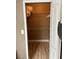 Organized closet space with shelving and hanging rods, maximizing storage potential at 3006 Bonfire Beach Dr # 102, Kissimmee, FL 34746