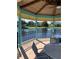 Relaxing gazebo overlooking the lake with seating for residents to enjoy the view at 3006 Bonfire Beach Dr # 102, Kissimmee, FL 34746