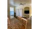 Living area with TV niche and hardwood floors at 3006 Bonfire Beach Dr # 102, Kissimmee, FL 34746