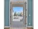 Private balcony with view of neighborhood at 3088 Parrot Head Pl, Kissimmee, FL 34747