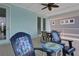 Relaxing balcony with outdoor seating and ceiling fan at 3088 Parrot Head Pl, Kissimmee, FL 34747