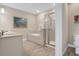 Bathroom with a soaking tub and shower at 3088 Parrot Head Pl, Kissimmee, FL 34747