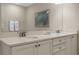 Double vanity bathroom with a large mirror and plenty of cabinet space at 3088 Parrot Head Pl, Kissimmee, FL 34747