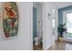 Small half bathroom with toilet and tropical-themed decor at 3088 Parrot Head Pl, Kissimmee, FL 34747