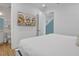 Bedroom with a queen-size bed and a large flat-screen TV at 3088 Parrot Head Pl, Kissimmee, FL 34747