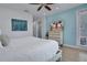 Spacious bedroom with a king-size bed and TV at 3088 Parrot Head Pl, Kissimmee, FL 34747