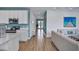 Modern kitchen with white cabinets and quartz countertops at 3088 Parrot Head Pl, Kissimmee, FL 34747