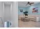 Living room with sectional sofa and coffee table at 3088 Parrot Head Pl, Kissimmee, FL 34747