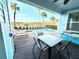 Private pool and patio with seating for outdoor dining and relaxation at 3088 Parrot Head Pl, Kissimmee, FL 34747