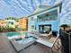Private pool and spa with lounge chairs and outdoor patio furniture at 3088 Parrot Head Pl, Kissimmee, FL 34747