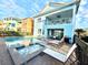 Private pool and spa with lounge chairs and outdoor patio furniture at 3088 Parrot Head Pl, Kissimmee, FL 34747