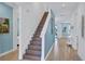 Staircase leading to upper level at 3088 Parrot Head Pl, Kissimmee, FL 34747