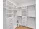 Large walk-in closet with ample shelving at 3088 Parrot Head Pl, Kissimmee, FL 34747