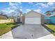 Front view of a two-story house with a white garage door at 3846 Long Grove Ln, Port Orange, FL 32129