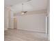 Spacious living room with vaulted ceilings and vinyl plank flooring at 3846 Long Grove Ln, Port Orange, FL 32129