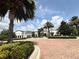 Beautifully landscaped exterior pathway leading to community amenities at 430 Captiva Dr, Davenport, FL 33896