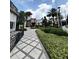 Beautifully landscaped exterior pathway leading to community amenities at 430 Captiva Dr, Davenport, FL 33896