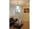 Cozy living space featuring neutral colors, a comfortable sofa, and a stylish coffee table at 430 Captiva Dr, Davenport, FL 33896