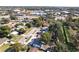 House nestled in a quiet residential neighborhood with green spaces at 5958 Lawnview Dr, Orlando, FL 32812