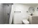 Clean bathroom with gray tile, shower, and vanity at 5958 Lawnview Dr, Orlando, FL 32812