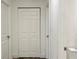 White double door closet with wood baseboard trim at 5958 Lawnview Dr, Orlando, FL 32812