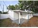 House exterior with white siding and covered porch at 5958 Lawnview Dr, Orlando, FL 32812