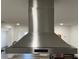 Stainless steel range hood with modern design at 5958 Lawnview Dr, Orlando, FL 32812