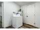 Bright laundry room with washer and dryer hookups at 5958 Lawnview Dr, Orlando, FL 32812