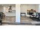 Open floor plan with kitchen, living area and home gym at 5958 Lawnview Dr, Orlando, FL 32812