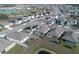 Aerial view of houses with solar panels at 613 Greymount St, Davenport, FL 33837