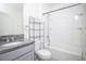 Bathroom features tub shower combo and granite vanity at 613 Greymount St, Davenport, FL 33837