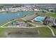 Community pool and playground with lake view at 613 Greymount St, Davenport, FL 33837