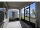 Peaceful screened porch overlooking a lake at 613 Greymount St, Davenport, FL 33837