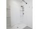 Large walk-in shower with built-in shelving at 613 Greymount St, Davenport, FL 33837